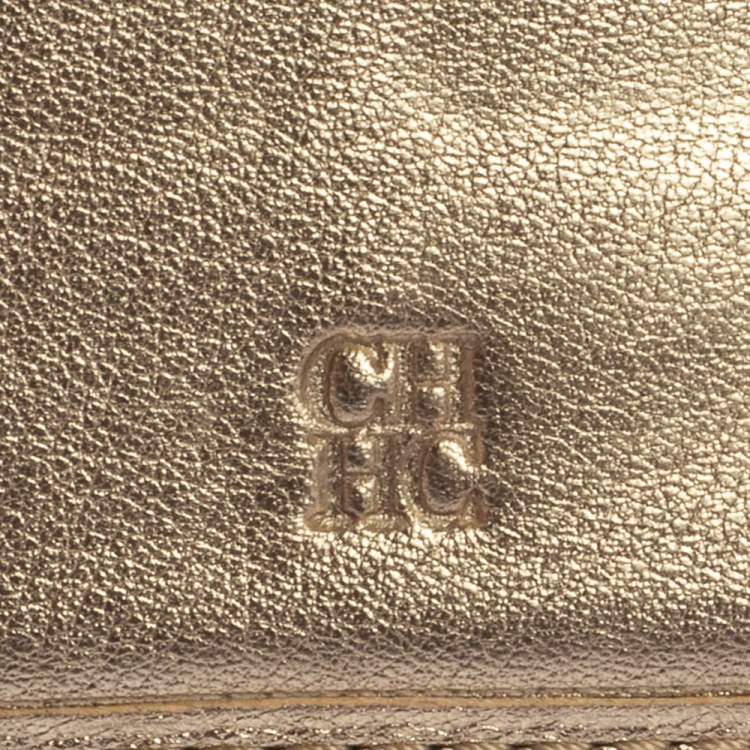 Pre Owned Carolina Herrera Gold Floral Embossed Leather Trifold Continental Wallet