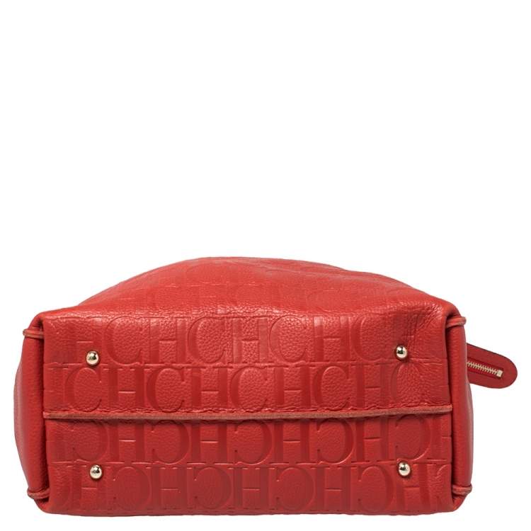 Pre Owned Carolina Herrera Red Monogram Embossed Leather Tassel Hobo