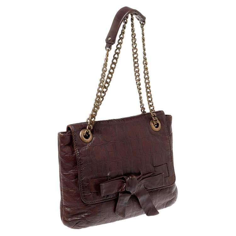 Pre Owned Carolina Herrera Dark Brown Monogram Embossed Leather Bow Flap Shoulder Bag