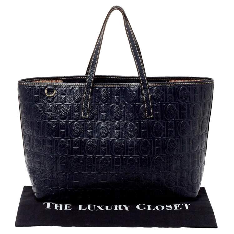 Pre Owned Carolina Herrera Navy Blue Monogram Embossed Leather Shopper Tote