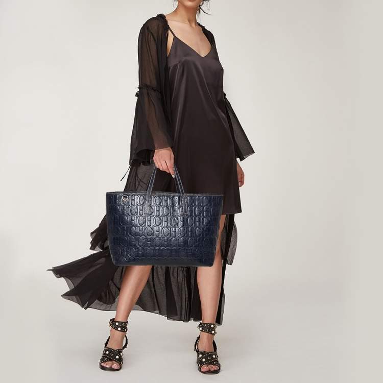 Pre Owned Carolina Herrera Navy Blue Monogram Embossed Leather Shopper Tote