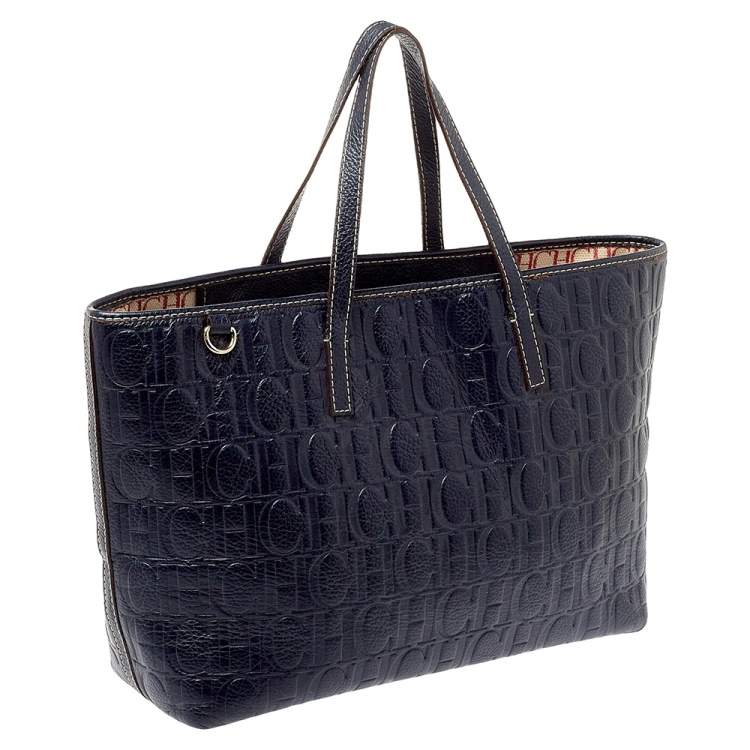 Pre Owned Carolina Herrera Navy Blue Monogram Embossed Leather Shopper Tote