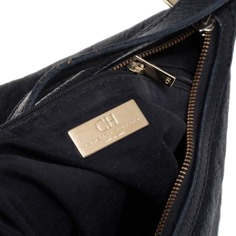 Pre Owned Carolina Herrera Black Monogram Embossed Leather Expandable Hobo