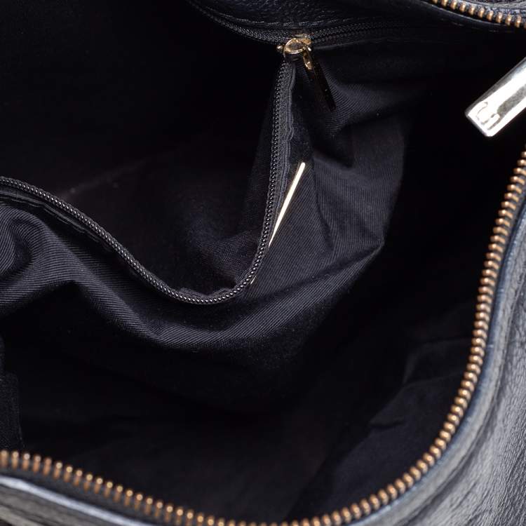 Pre Owned Carolina Herrera Black Monogram Embossed Leather Expandable Hobo