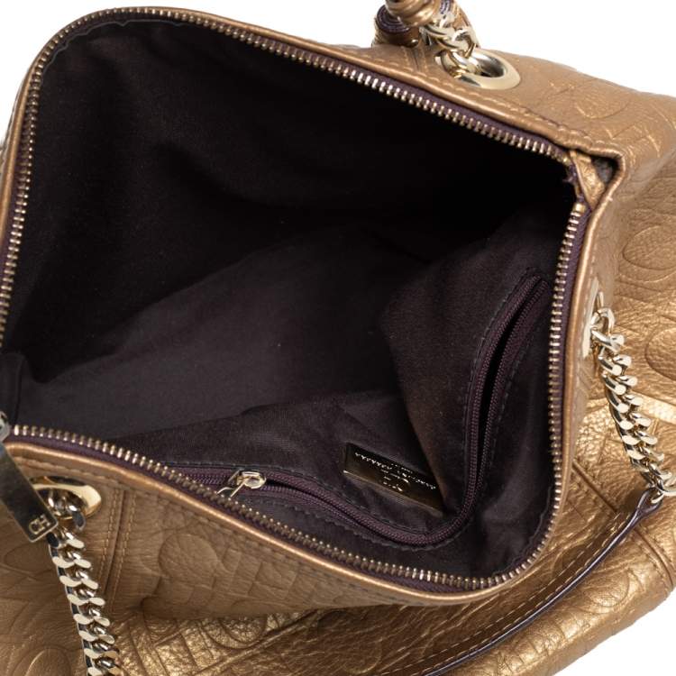 Pre Owned Carolina Herrera Golden Brown Monogram Embossed Leather Tassel Hobo