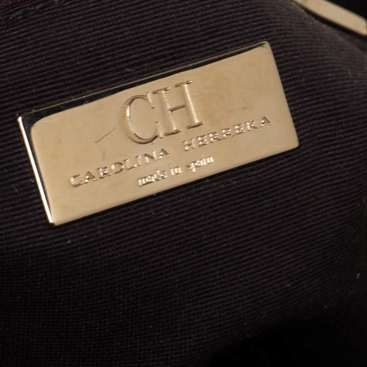 Pre Owned Carolina Herrera Golden Brown Monogram Embossed Leather Tassel Hobo
