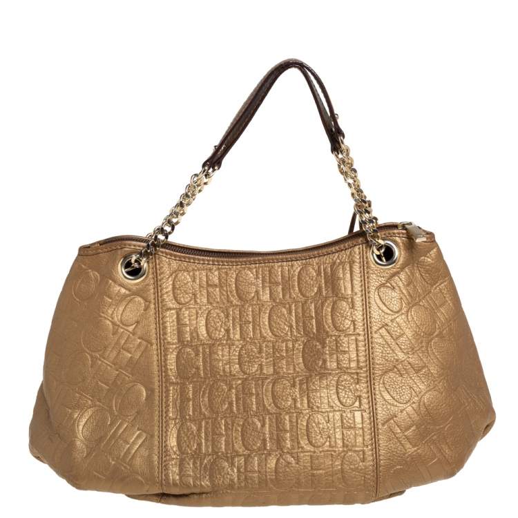 Pre Owned Carolina Herrera Golden Brown Monogram Embossed Leather Tassel Hobo