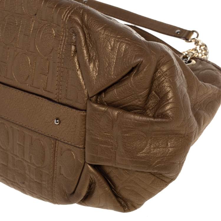 Pre Owned Carolina Herrera Golden Brown Monogram Embossed Leather Tassel Hobo
