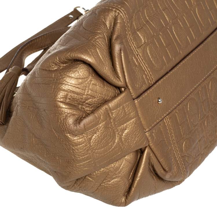 Pre Owned Carolina Herrera Golden Brown Monogram Embossed Leather Tassel Hobo