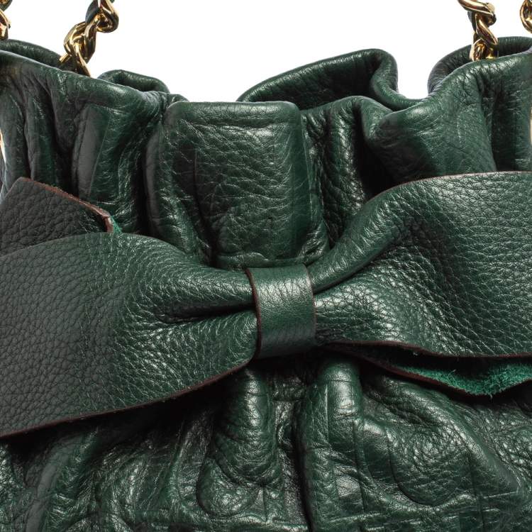Pre Owned Carolina Herrera Dark Green Monogram Embossed Leather Bow Bucket Shoulder Bag