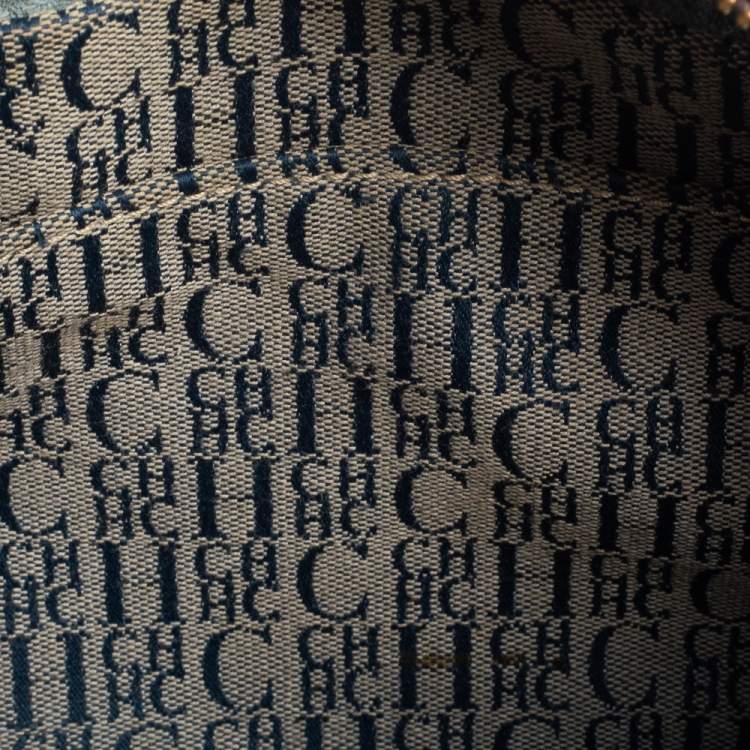 Pre Owned Carolina Herrera Powder Blue Monogram Embossed Leather Andy Boston Bag