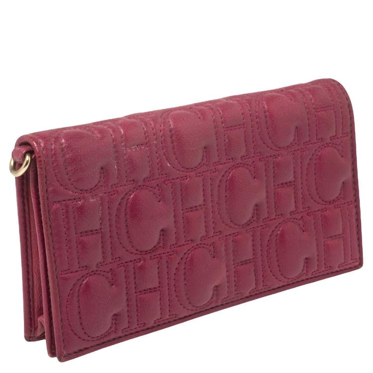 Pre Owned Carolina Herrera Magenta Logo Embossed Leather Flap Clutch  