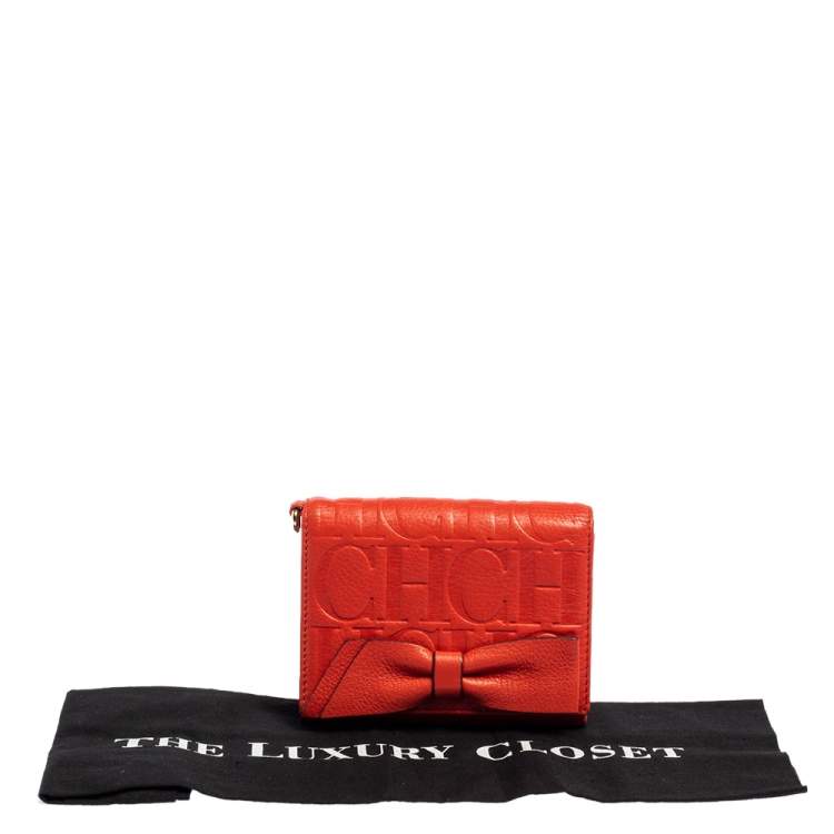 Pre Owned Carolina Herrera Orange Embossed Leather Bow Trifold Wallet