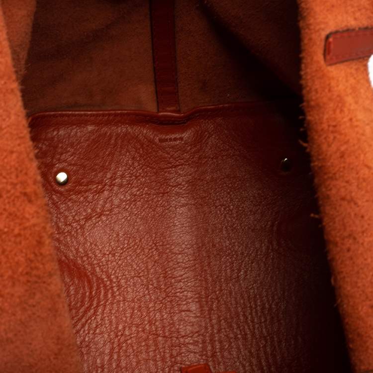 Pre Owned Carolina Herrera Orange Monogram Embossed Leather Matryoshka Tote