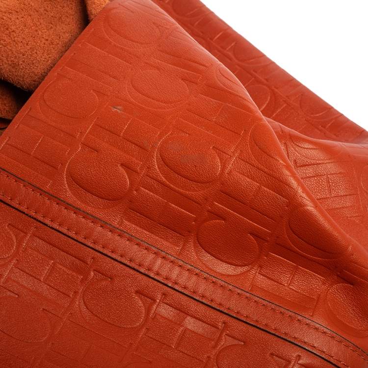 Pre Owned Carolina Herrera Orange Monogram Embossed Leather Matryoshka Tote