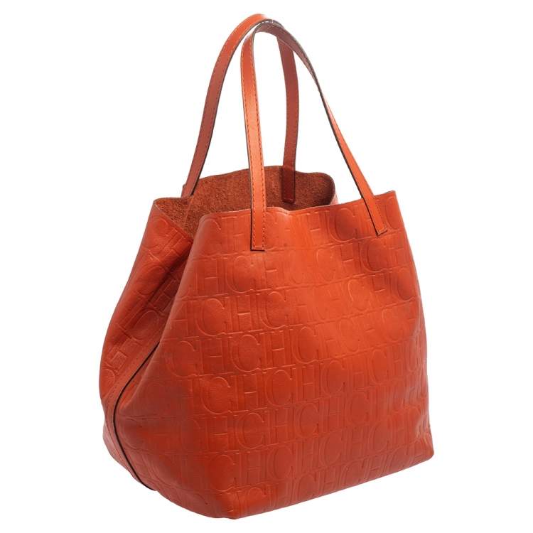 Pre Owned Carolina Herrera Orange Monogram Embossed Leather Matryoshka Tote