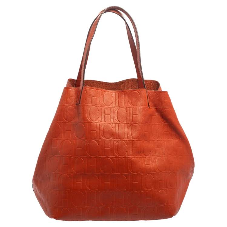 Pre Owned Carolina Herrera Orange Monogram Embossed Leather Matryoshka Tote