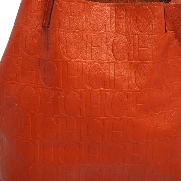 Pre Owned Carolina Herrera Orange Monogram Embossed Leather Matryoshka Tote