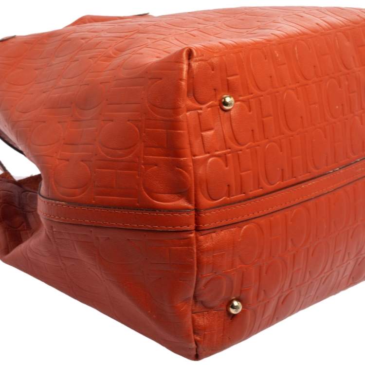 Pre Owned Carolina Herrera Orange Monogram Embossed Leather Matryoshka Tote