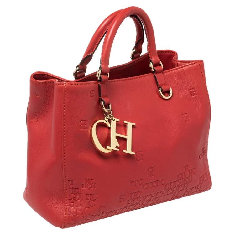 Pre Owned Carolina Herrera Red Leather Logo Embossed Charm Tote