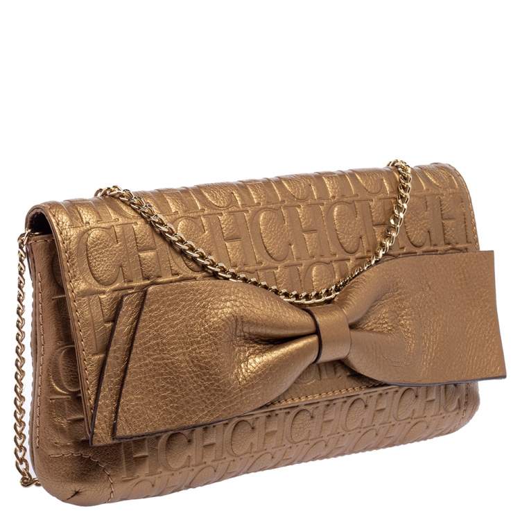 Pre Owned Carolina Herrera Gold Monogram Embossed Leather Bow Chain Clutch 
