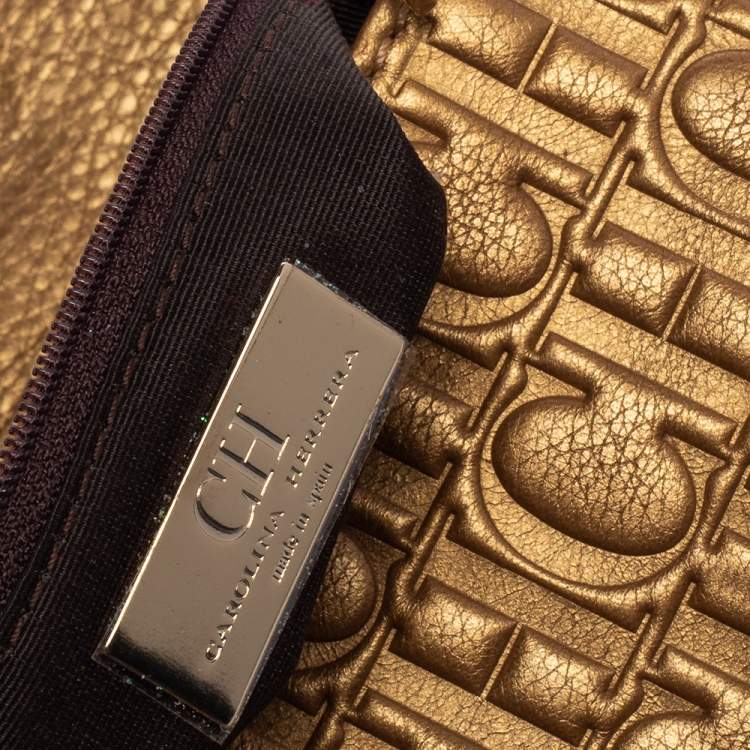 Pre Owned Carolina Herrera Gold Monogram Embossed Leather Bow Chain Clutch 