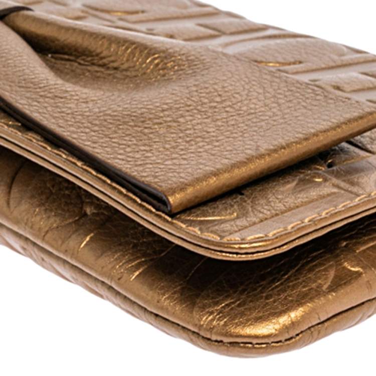 Pre Owned Carolina Herrera Gold Monogram Embossed Leather Bow Chain Clutch 