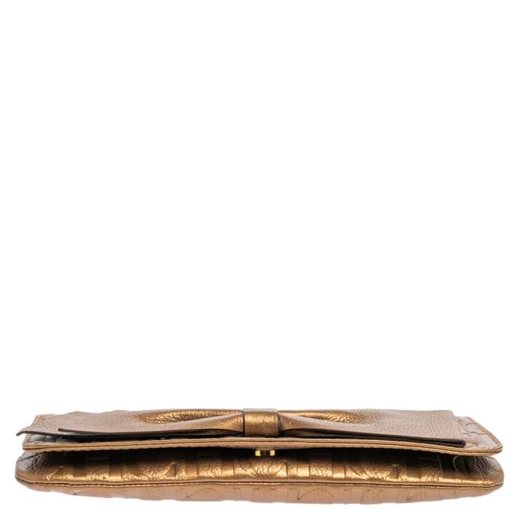 Pre Owned Carolina Herrera Gold Monogram Embossed Leather Bow Chain Clutch 