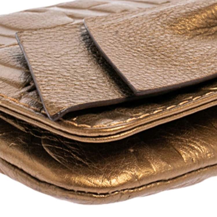 Pre Owned Carolina Herrera Gold Monogram Embossed Leather Bow Chain Clutch 