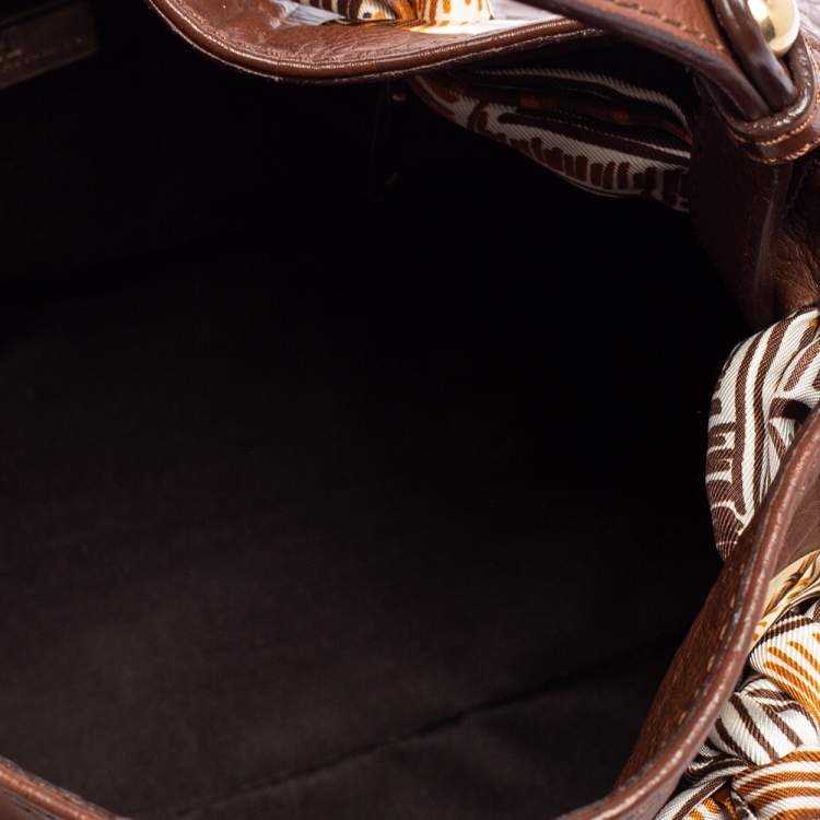 Pre Owned Carolina Herrera Brown Monogram Embossed Leather Scarf Hobo