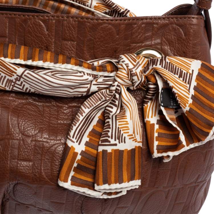 Pre Owned Carolina Herrera Brown Monogram Embossed Leather Scarf Hobo
