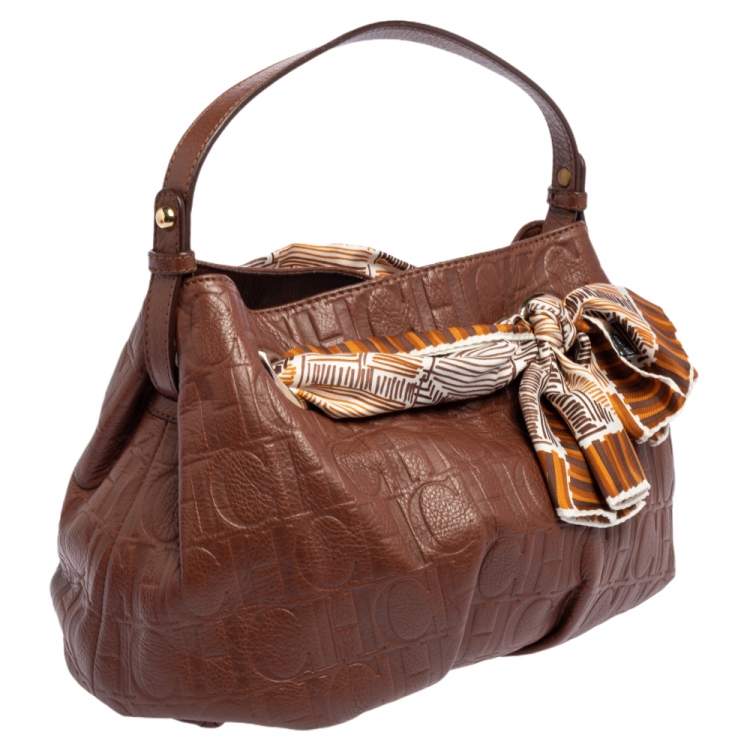 Pre Owned Carolina Herrera Brown Monogram Embossed Leather Scarf Hobo