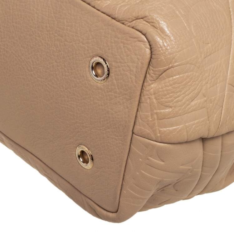 Pre Owned Carolina Herrera Beige Monogram Embossed Leather Drawstring Tote