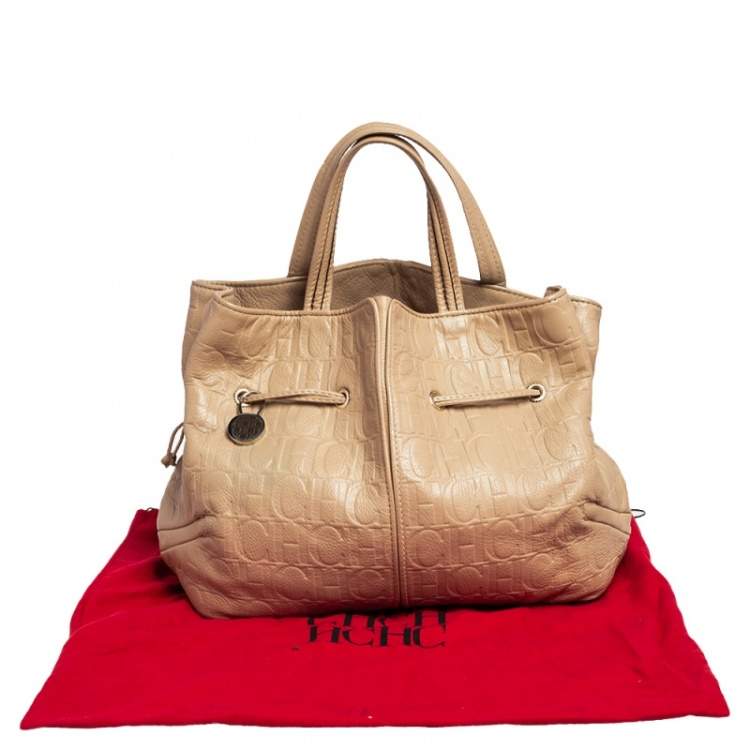 Pre Owned Carolina Herrera Beige Monogram Embossed Leather Drawstring Tote