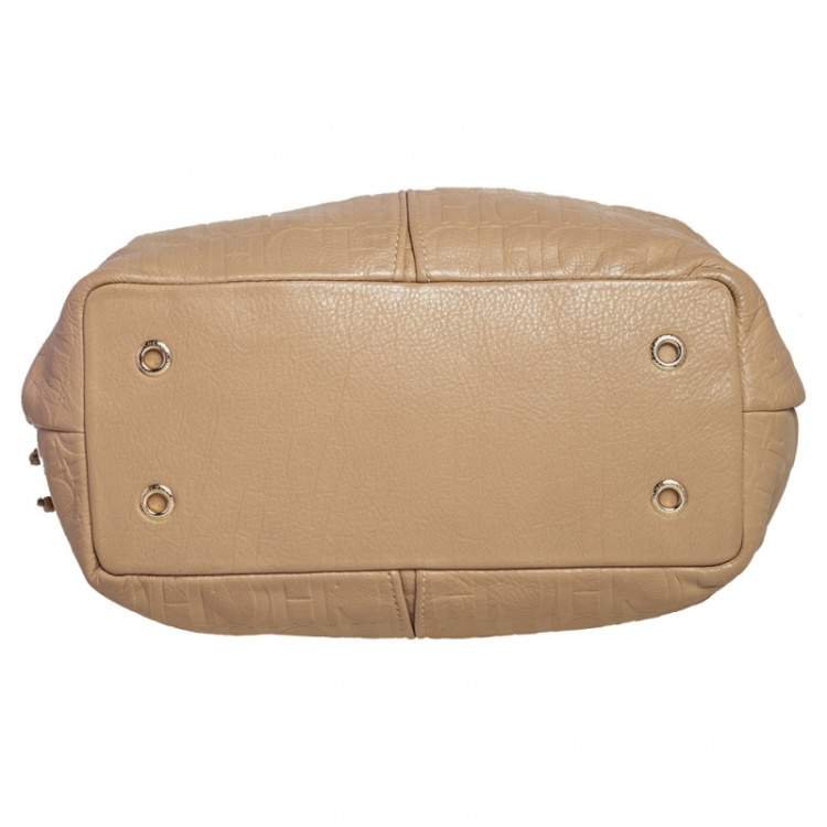 Pre Owned Carolina Herrera Beige Monogram Embossed Leather Drawstring Tote