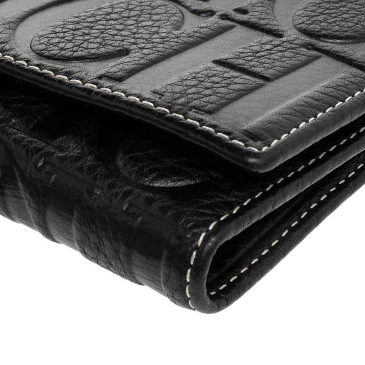 Pre Owned Carolina Herrera Black Monogram Embossed Leather Trifold Continental Wallet