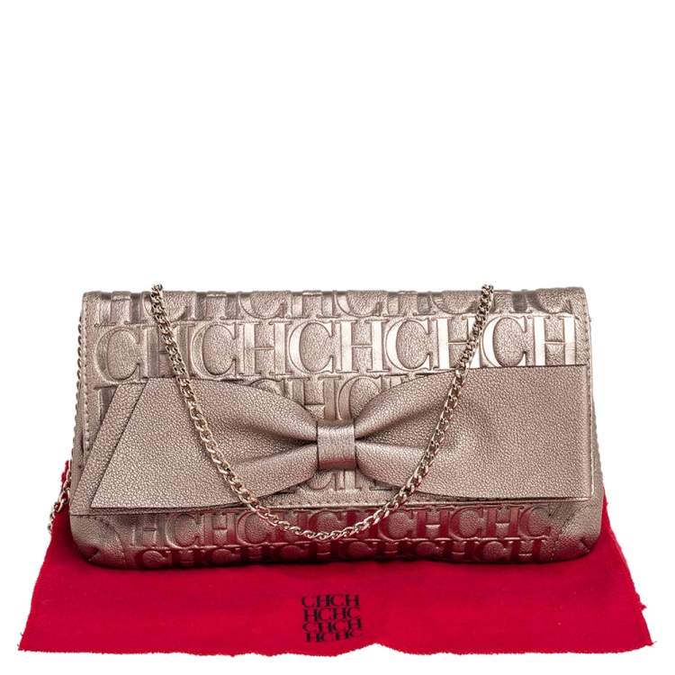 Pre Owned Carolina Herrera Metallic Gold Monogram Embossed Leather Bow Chain Clutch
