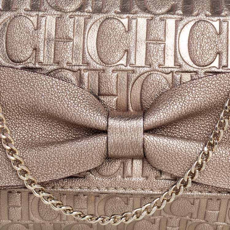 Pre Owned Carolina Herrera Metallic Gold Monogram Embossed Leather Bow Chain Clutch