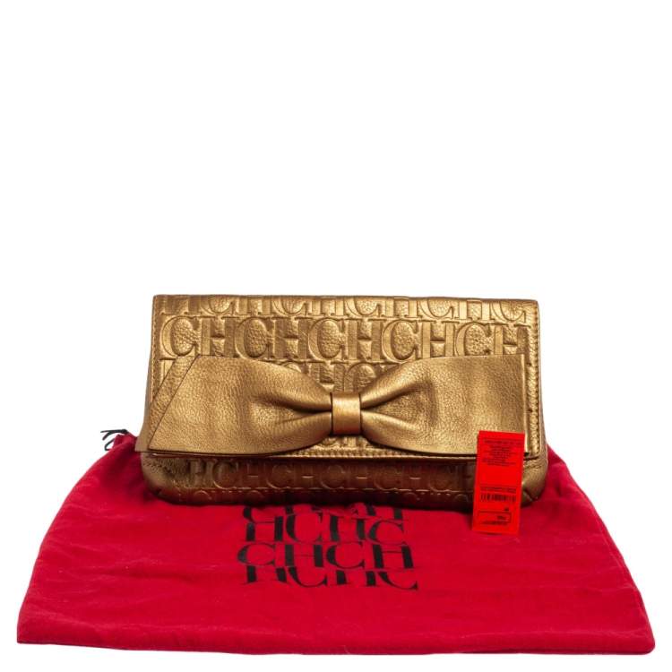 Pre Owned Carolina Herrera Gold Monogram Embossed Leather Bow Flap Clutch