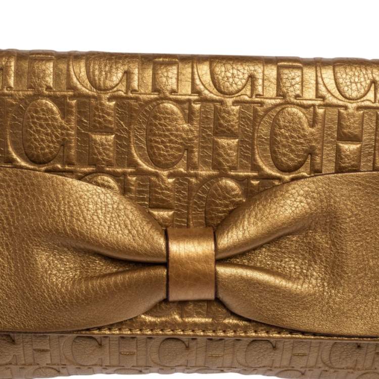 Pre Owned Carolina Herrera Gold Monogram Embossed Leather Bow Flap Clutch