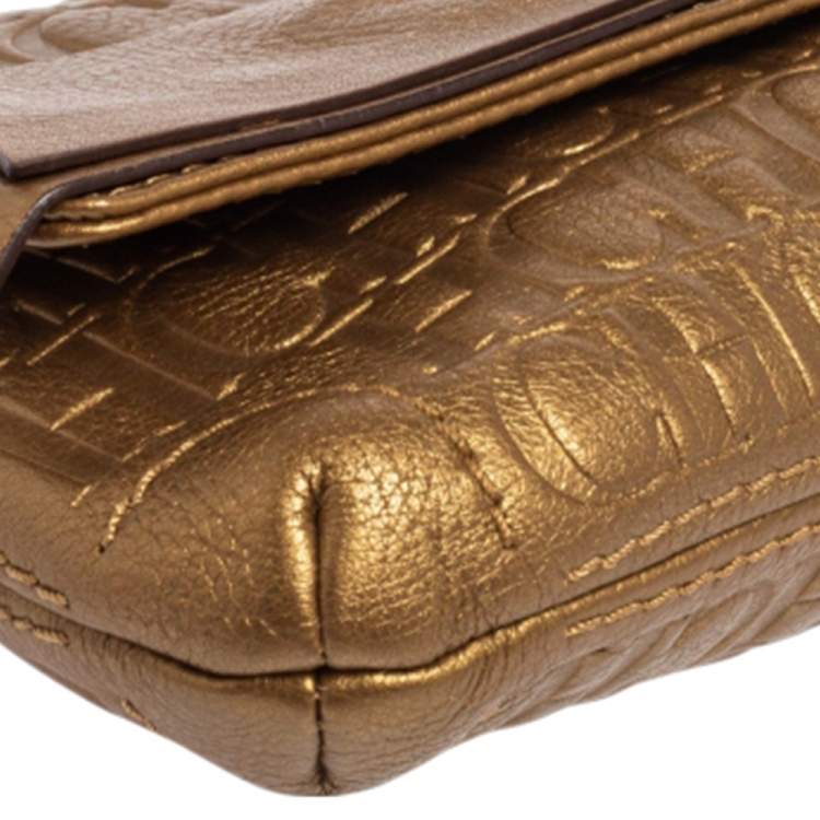 Pre Owned Carolina Herrera Gold Monogram Embossed Leather Bow Flap Clutch