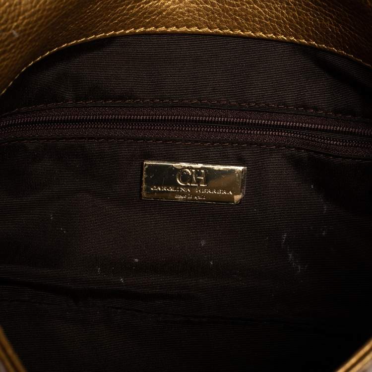 Pre Owned Carolina Herrera Gold Monogram Embossed Leather Bow Flap Clutch