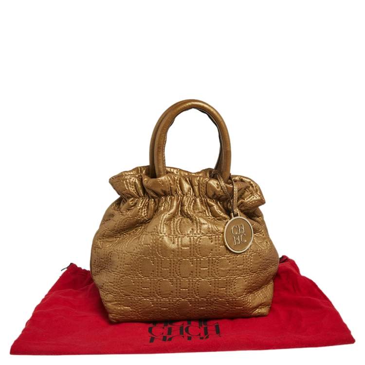 Pre Owned Carolina Herrera Gold Monogram Embossed Leather Bucket Bag