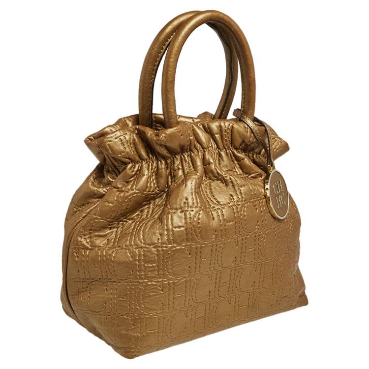 Pre Owned Carolina Herrera Gold Monogram Embossed Leather Bucket Bag