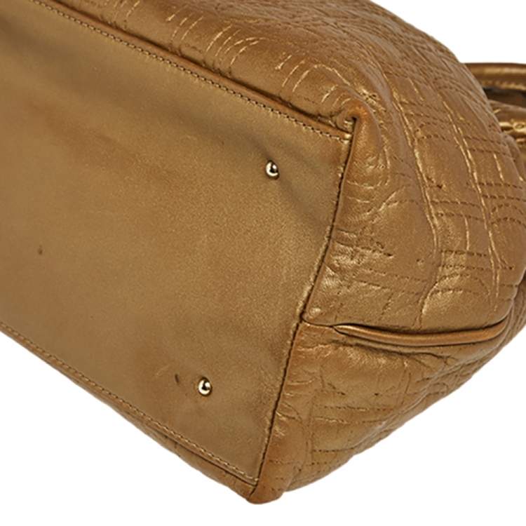 Pre Owned Carolina Herrera Gold Monogram Embossed Leather Bucket Bag
