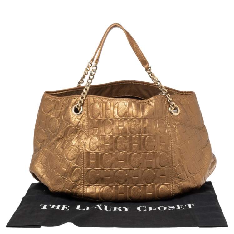 Pre Owned Carolina Herrera Gold Monogram Embossed Leather Chain Hobo