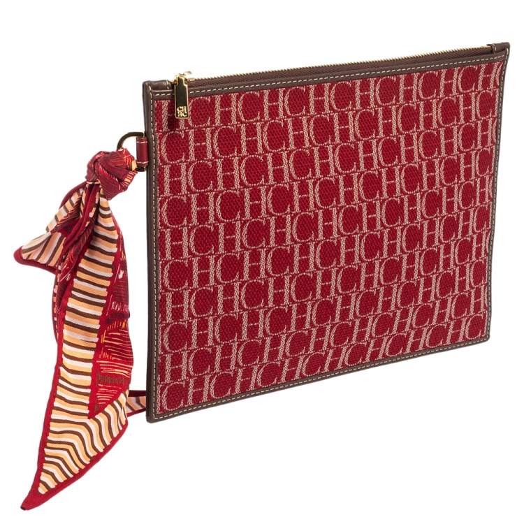 Pre Owned Carolina Herrera Red Monogram Canvas and Leather Pouch 