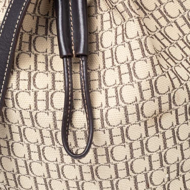 Pre Owned Carolina Herrera Brown/Beige Monogram Canvas and Leather Drawstring Bucket Bag