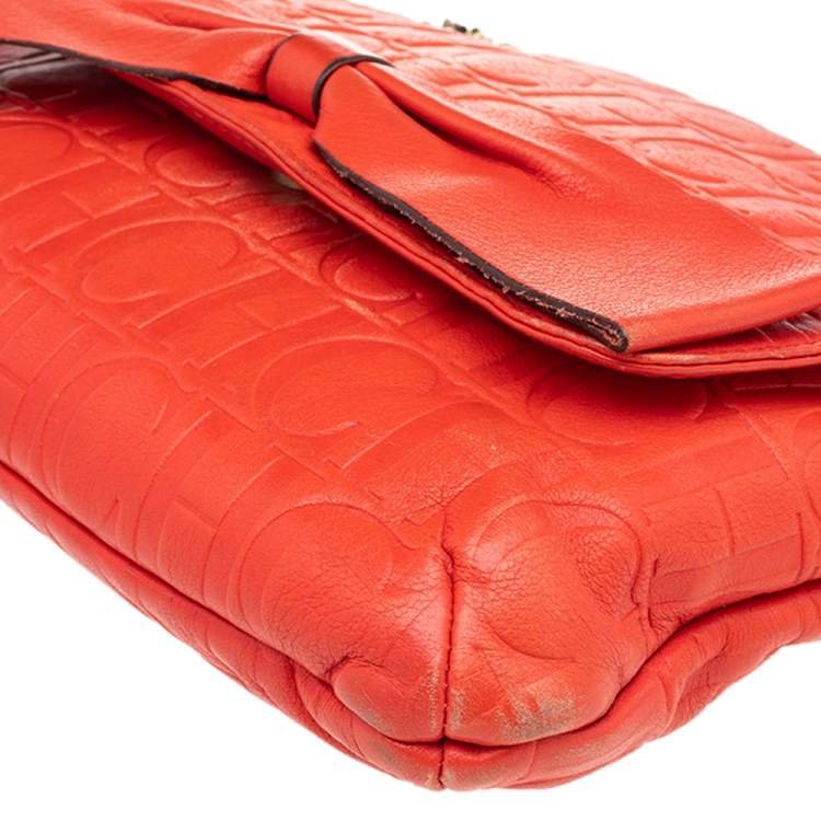 Pre Owned Carolina Herrera Orange Monogram Embossed Leather Audrey Shoulder Bag