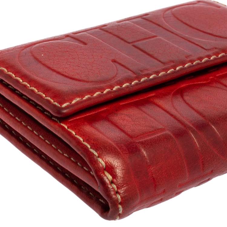 مملوكة مسبقًا Carolina Herrera Monogram Embossed Leather Compact Wallet